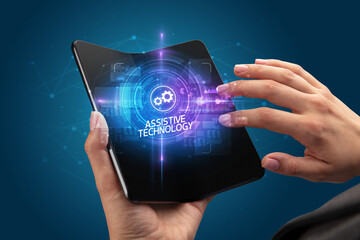 Businessman holding a foldable smartphone, technology concept