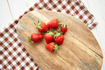 fresh strawberries on wooden board fruit vitamins summer