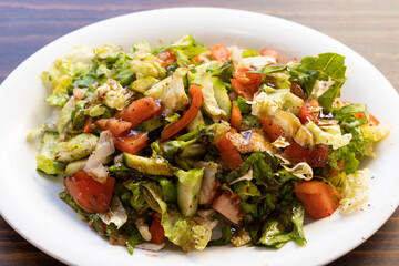 a delicious mixed salad on the plate