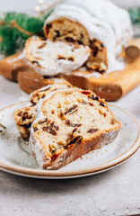 Traditional Christmass stollen on stone background.