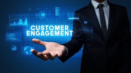 Hand of Businessman holding motivational message