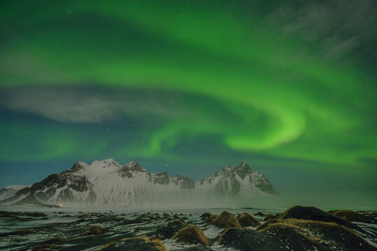 aurora borealis in the mountains © Lucian Constantin