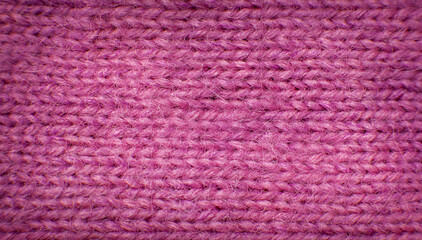 lilac knitted cozy background close-up