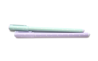 Lilac and green pen on white background