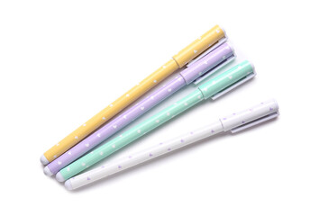 Fototapeta premium Colorful pens on white background