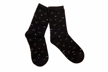 Two black socks with floral pattern isolated on the white background