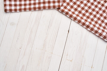Fototapeta na wymiar plaid tablecloth wooden texture kitchen decoration design