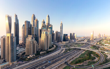 Naklejka na ściany i meble Aerial view of cityscape and skyline in Marina.Dubai UAE at sunset.