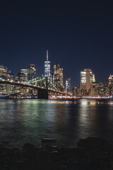 waterfront scenic city skyline at night in new york city