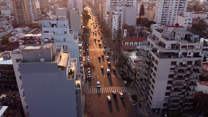 Aerial shot over busy street of Buenos Aires at sunset, Argentina