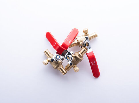 New valve on white background. Plumbing supply concept.