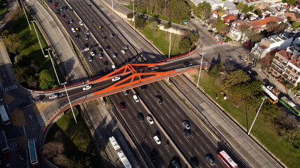 Aerial view of Bridge over Panamerican Highway in Buenos Aires, Argentina. Busy traffic on the road...