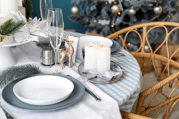 Dining table with setting for Christmas celebration indoors