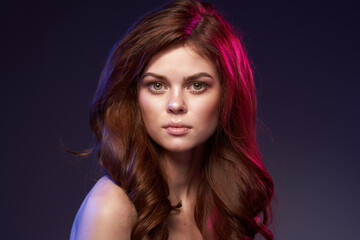 portrait of a woman makeup posing naked shoulders hairstyle cropped view