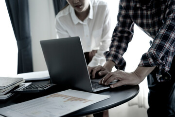 Businessman and businesswoman standing work
