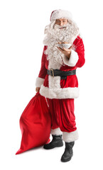 Santa Claus with tasty cookies and bag on white background