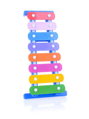 Multi-colored children's xylophone isolated on a white background