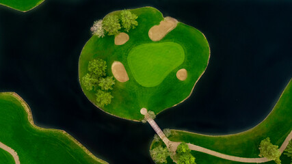 Aerial golf course images of scenic golf holes.