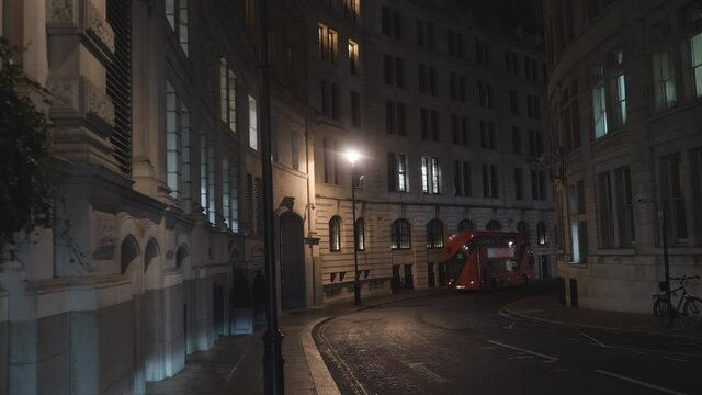 An empty street in central London at night.