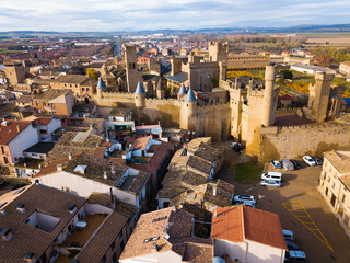 Aerial view of impressive medieval Royal Palace of Olite in autumn day, Navarre, Spain..