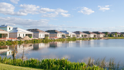 Construction of new houses and condos in a retirement community and golf neighborhood in Bonita...