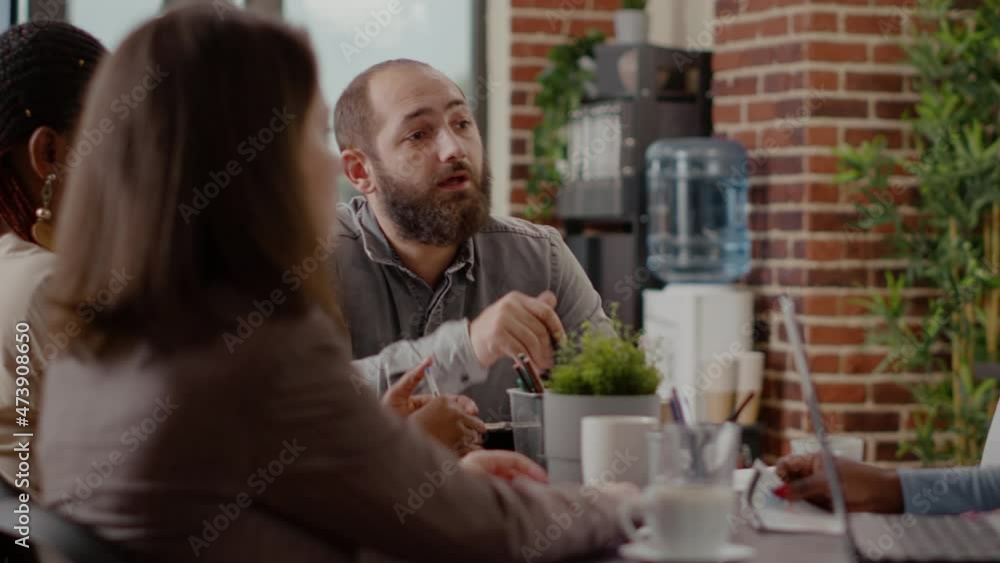 Poster close up of business man discussing strategy plan with people at briefing meeting. worker explaining