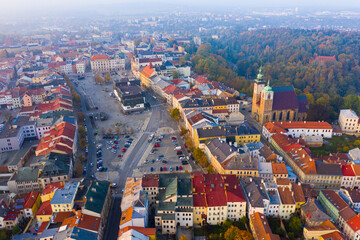 Aerial view of historical centre of Jihlava in autumn day overlooking Masaryk Square with Saint Ignatius Church and City Hall, Czech Republic..