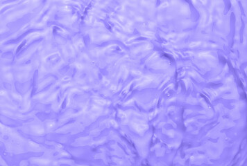 Waves and ripples on violet water close up. Color of the year 2022 Very Peri concept.
