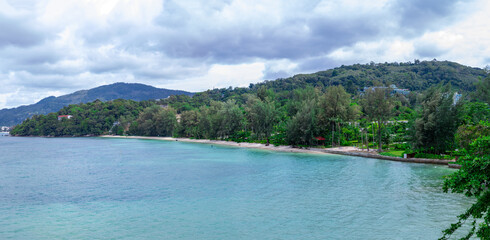 view of Patong and patong beach with the buildings and high-rise hotels and resorts in the background Kathu phuket Thailand 