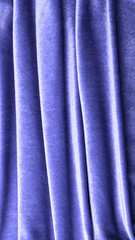 Chic velvet fabric curtain in trendy lavender color pery. Catwalk to advertise products trending color 2022. Copy space horizontal frame
