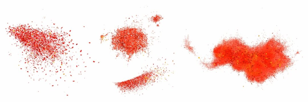 Scatters of red pepper powder. Vector realistic illustration of ground paprika and chili pepper seasoning. Splashes of hot dried spice isolated on white background