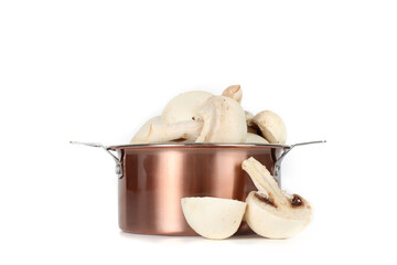 mushroom in a small copper pan on a white background 