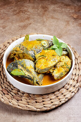 Pangek ikan tuna or tuna fish curry is a  traditional dish from Padang, Indonesia.