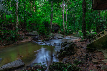 Obraz premium Kathu waterfall water gently flowing down the rocks Patong Phuket Thailand Asia
