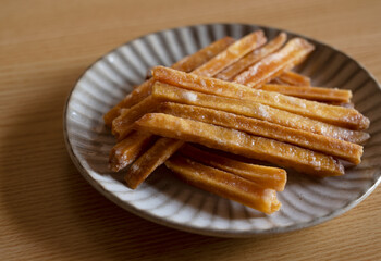 Imokempi placed on a wooden background