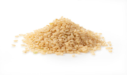 Brown rice on a white background.
