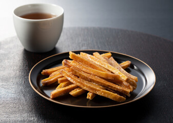 Imokempi placed on a wooden background