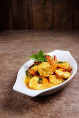Udang Tuturuga, a traditional food from Manado, East Indonesia. Made from shrimp with so many spices, herb and coocnut milk.