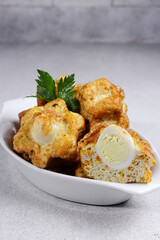Tahu fantasi or tahu sarang burung is steamed tofu with quail eggs.
