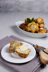 Tahu fantasi or tahu sarang burung is steamed tofu with quail eggs.