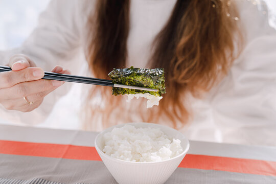 Korean laver on top of white rice.