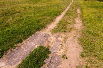 a narrow road for pedestrians and vehicles