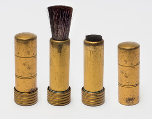 A very old brush that was used to clean photographic lenses and other optical devices. Photographic antique.