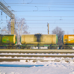 Railway tanks at the station against the blue sky
