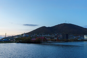 Fototapeta premium Urban landscape with lake and mountain views. Petropavlovsk-Kamchatsky