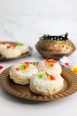 Rasmalai or Malai Sandwich, Roshmolai, Rasamalei is very popular Indian dessert. A sweet malai stuffing inside Rasgulla. It's a sweet delicacy made with Indian cottage cheese or chenna. Copy space.