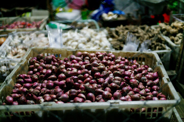 onion in traditional market at night