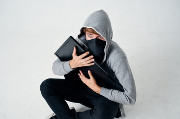 hacker hooded head hacking technology security light background
