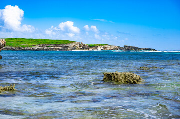 uninhabited island in the caribbean and atlantic ocean on the border