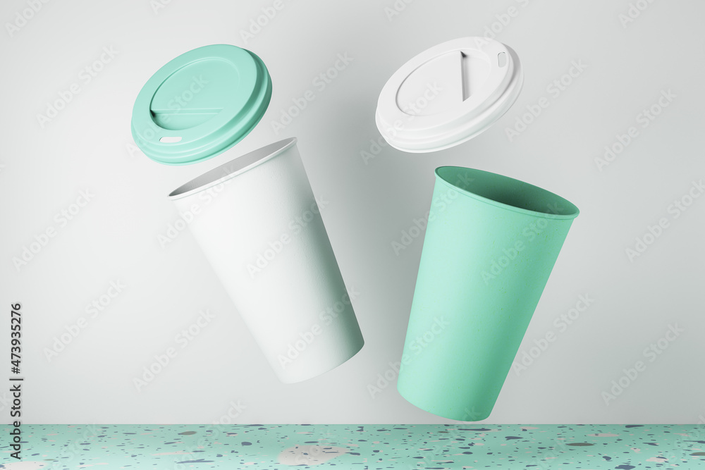 Poster empty blue take away coffee cup on white background and marble surface. advertisement and mock up co